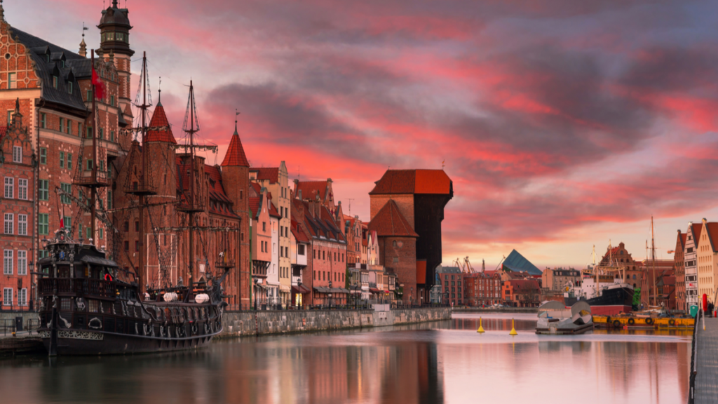 Gdansk with beautiful old town over Motlawa river at sunset, Poland.